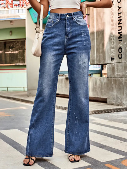 Pantalones de mezclilla acampanados de cintura media versátiles.