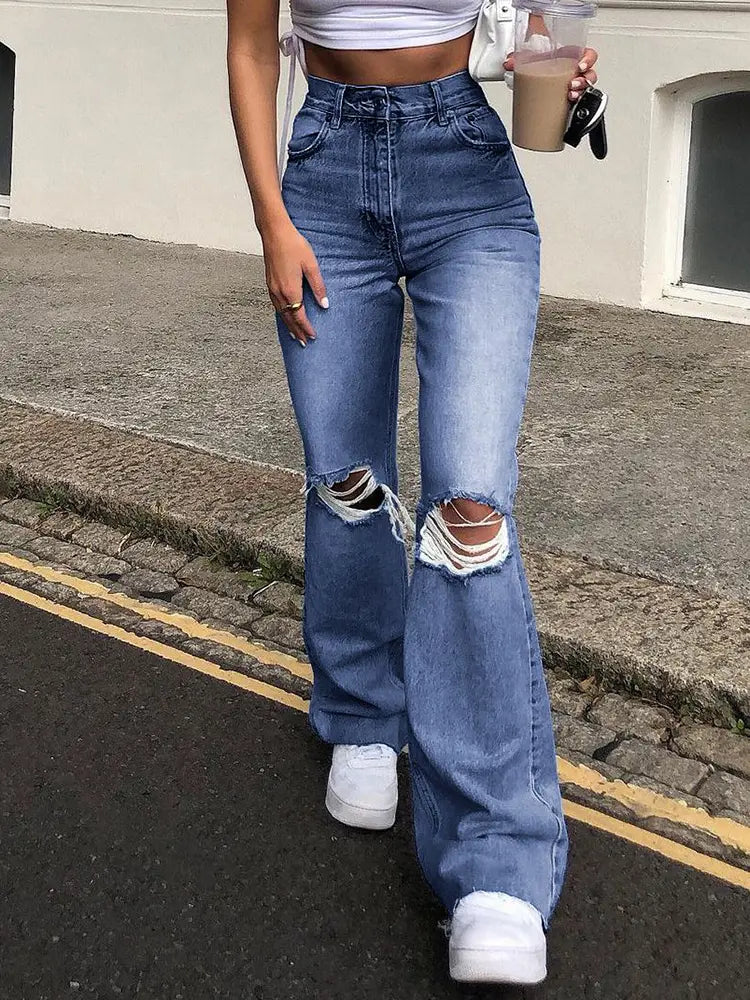 Jeans de pierna ancha con roturas y campana.